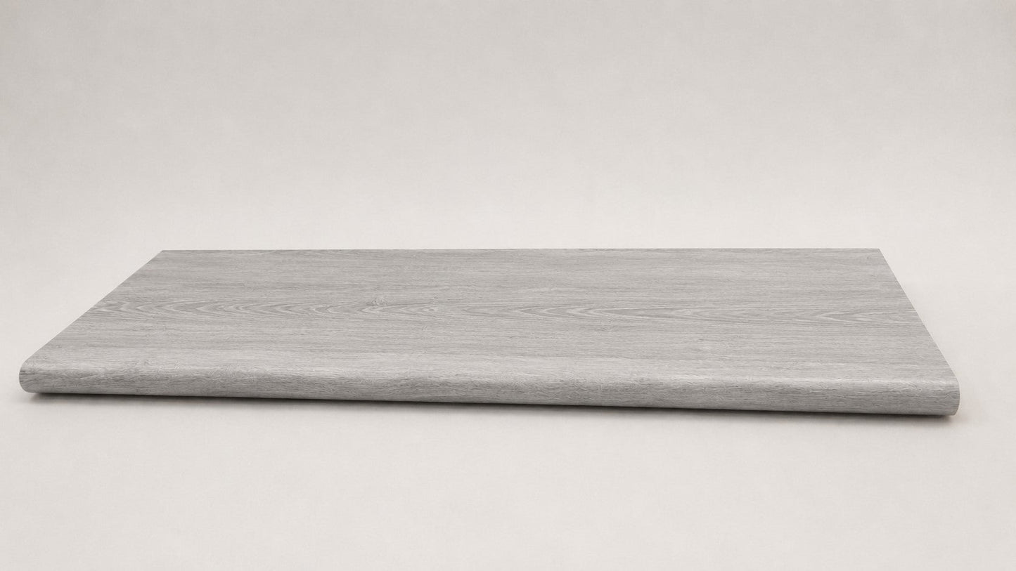 Custom round-nose stair tread made from NuCore Wisteria flooring. Round profile. Full view.