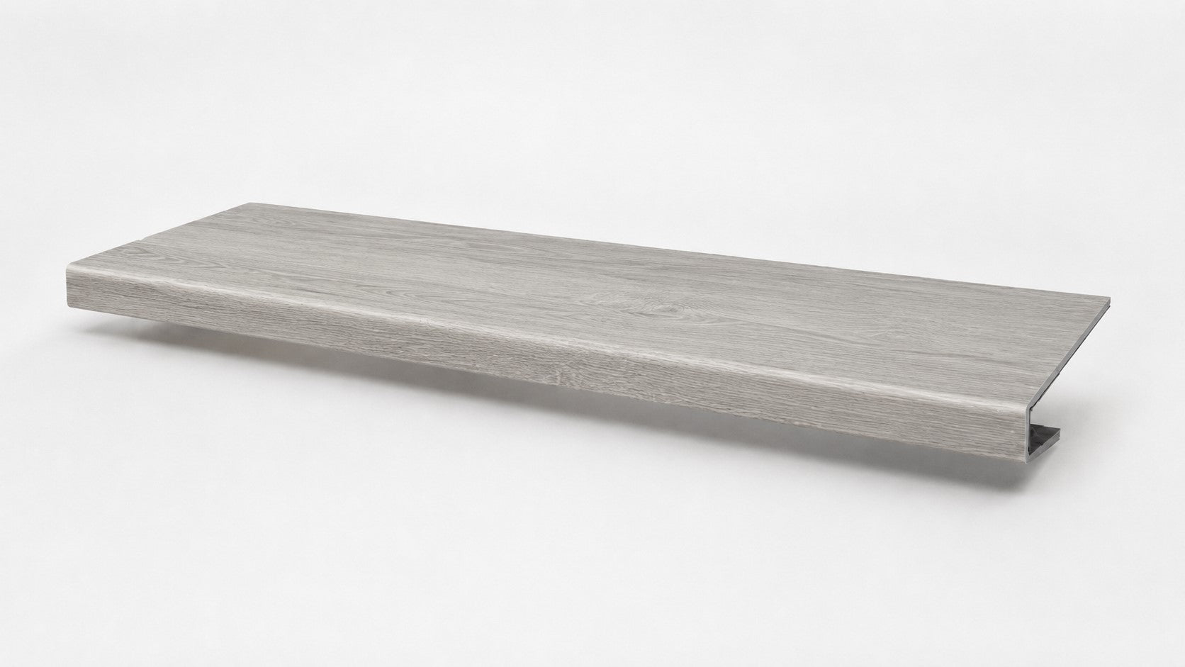 Custom square-nose stair tread made from NuCore Wisteria flooring. Square profile. Full view.