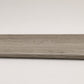 Custom round-nose stair tread made from Style Selections Ashen Oak flooring. Round profile. Full view.