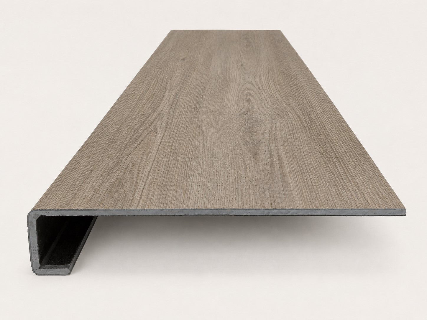 Custom square-nose stair tread made from Style Selections Ashen Oak flooring. Square profile. Front view.