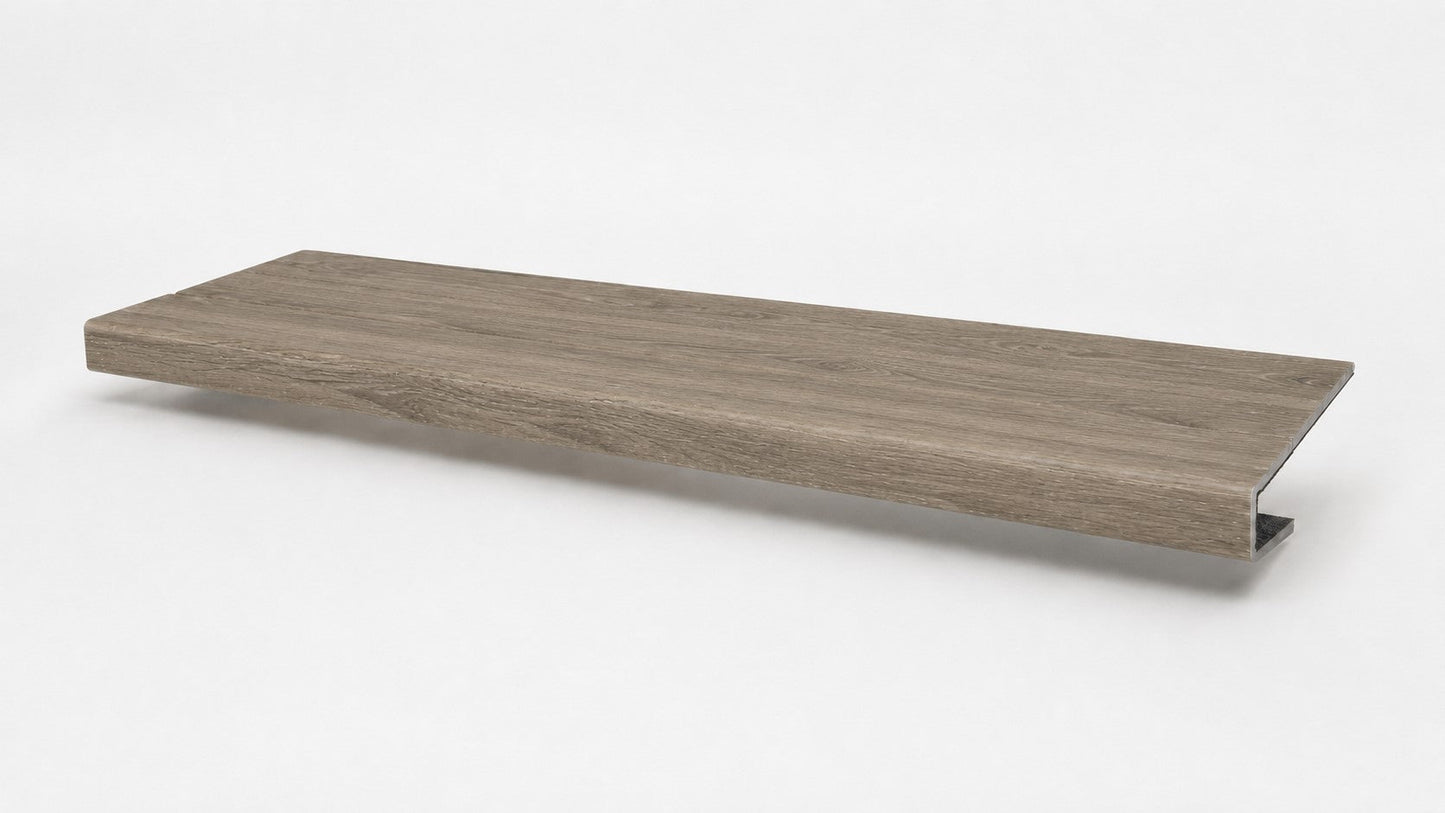 Custom square-nose stair tread made from Style Selections Ashen Oak flooring. Square profile. Full view.