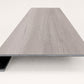 Custom square-nose stair tread made from Style Selections Charleston Oak flooring. Square profile. Front view.