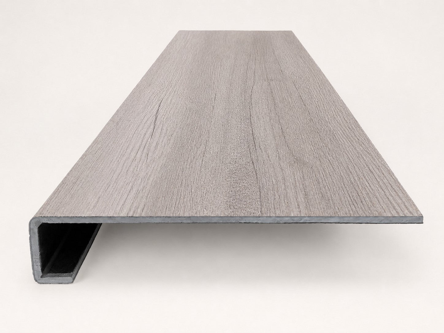 Custom square-nose stair tread made from Style Selections Charleston Oak flooring. Square profile. Front view.