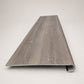 Custom round-nose stair tread made from Style Selections Dove Tail Oak flooring. Round profile. Front view.