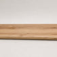 Custom round-nose stair tread made from Style Selections Jamestown Hickory flooring. Round profile. Full view.