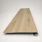 Custom round-nose stair tread made from Style Selections Natural Hickory flooring. Round profile. Front view.