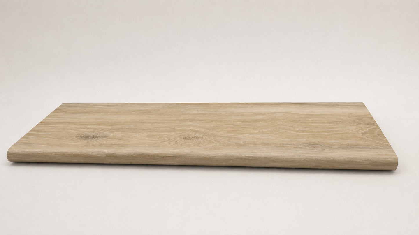Custom round-nose stair tread made from Style Selections Natural Hickory flooring. Round profile. Full view.