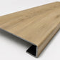Custom square-nose stair tread made from Style Selections Natural Hickory flooring. Square profile. Angled view.