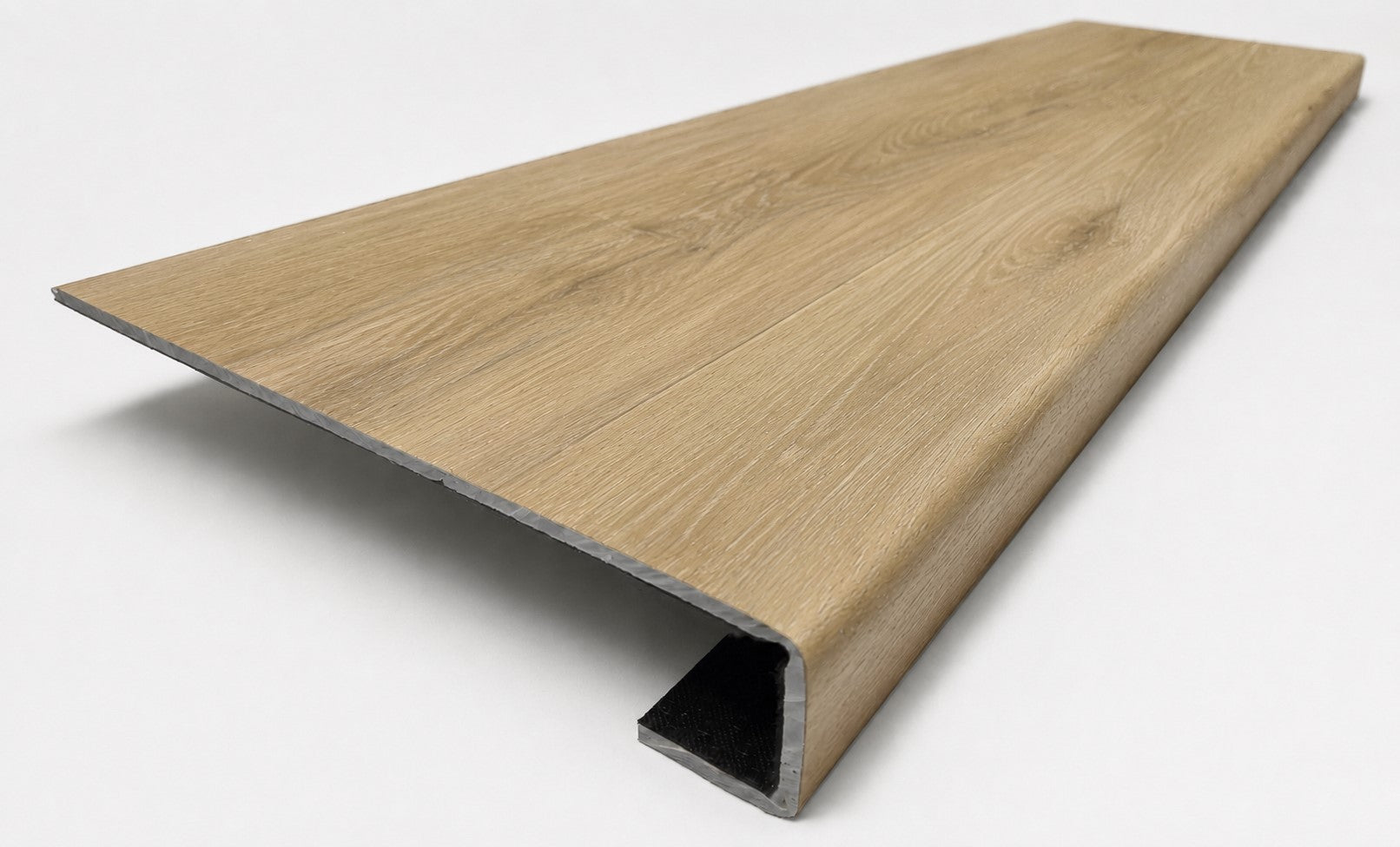 Custom square-nose stair tread made from Style Selections Natural Hickory flooring. Square profile. Angled view.