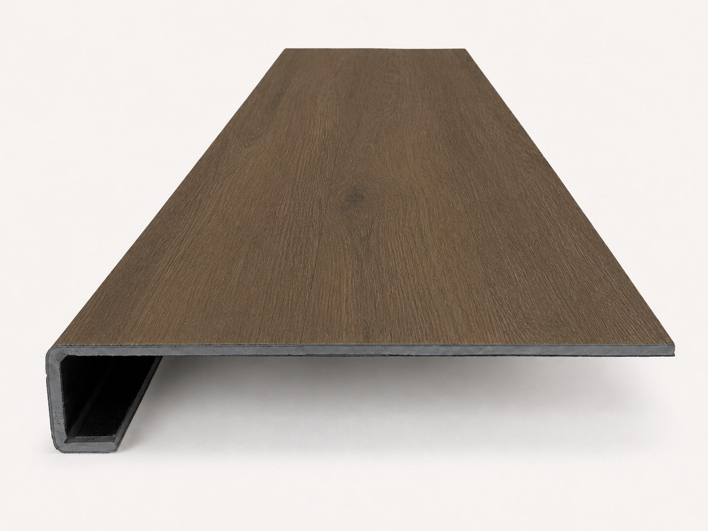 Custom square-nose stair tread made from Style Selections Tudor Oak flooring. Square profile. Front view.